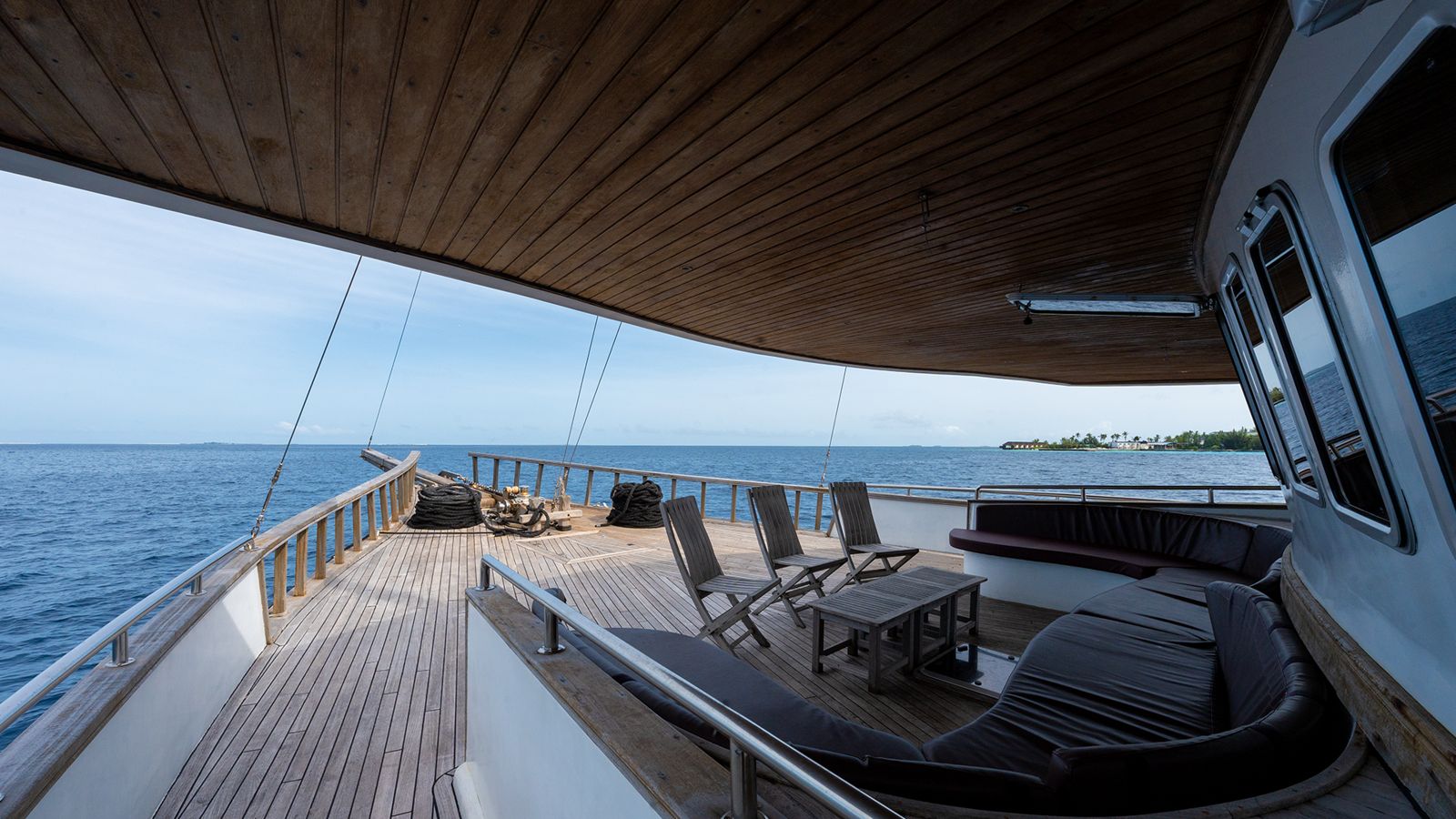 Covered aft deck and seating aboard Gurahali